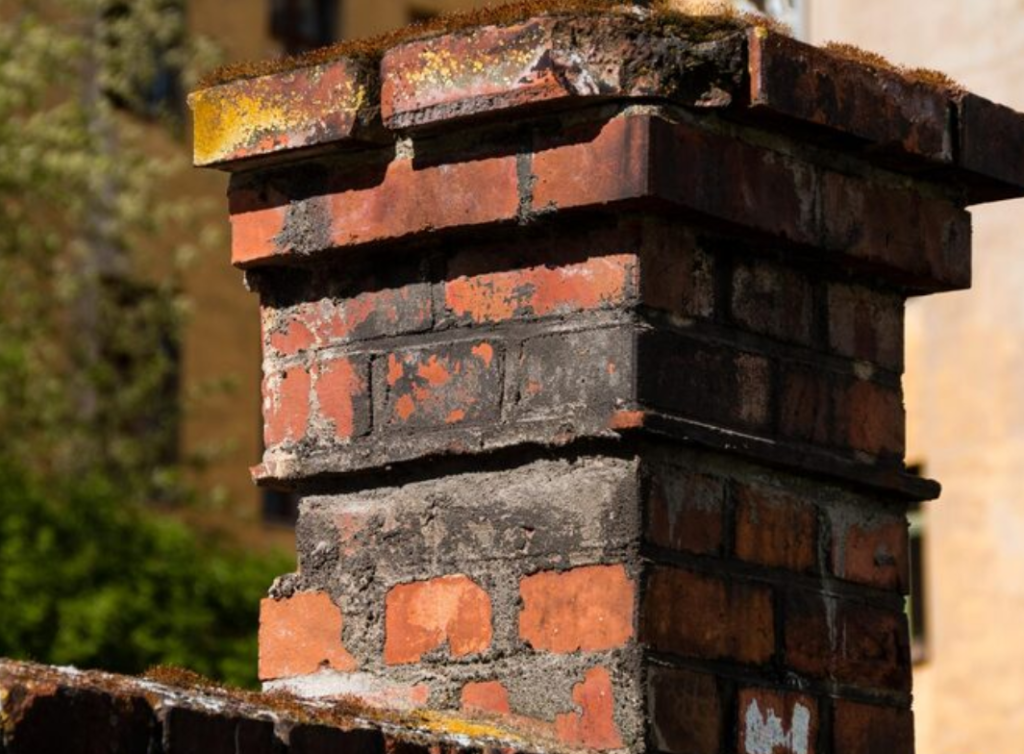 Top 5 Signs Your Chimney Needs Cleaning in Plano 2 peeling brick mortar chimney
